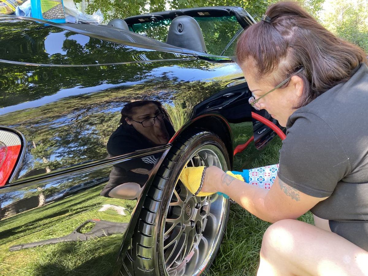 Polishing a deep, glossy black finish by Black Rock Mobile Detailing in Sandpoint, Idaho